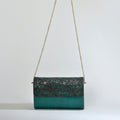 Emerald Etchings Carved Clutch