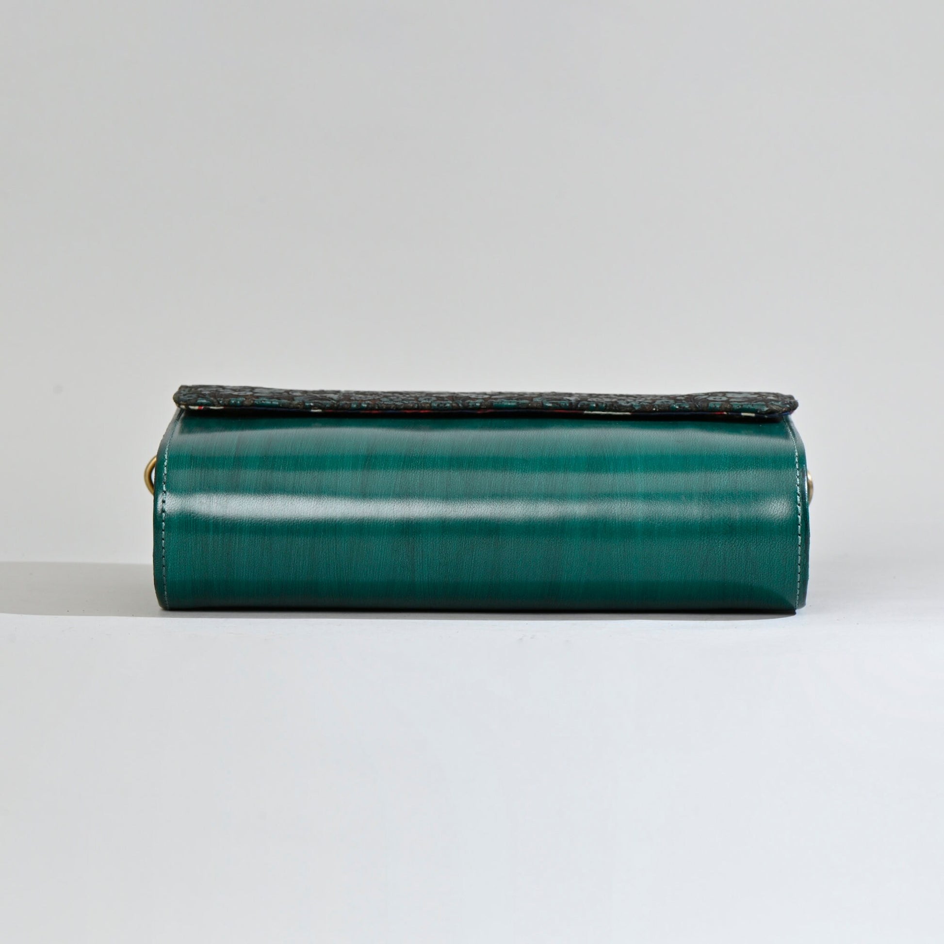 Emerald Etchings Carved Clutch