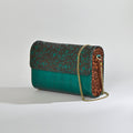 Emerald Etchings Carved Clutch